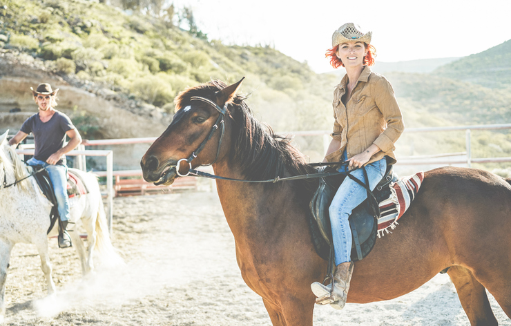 Couple riding horses